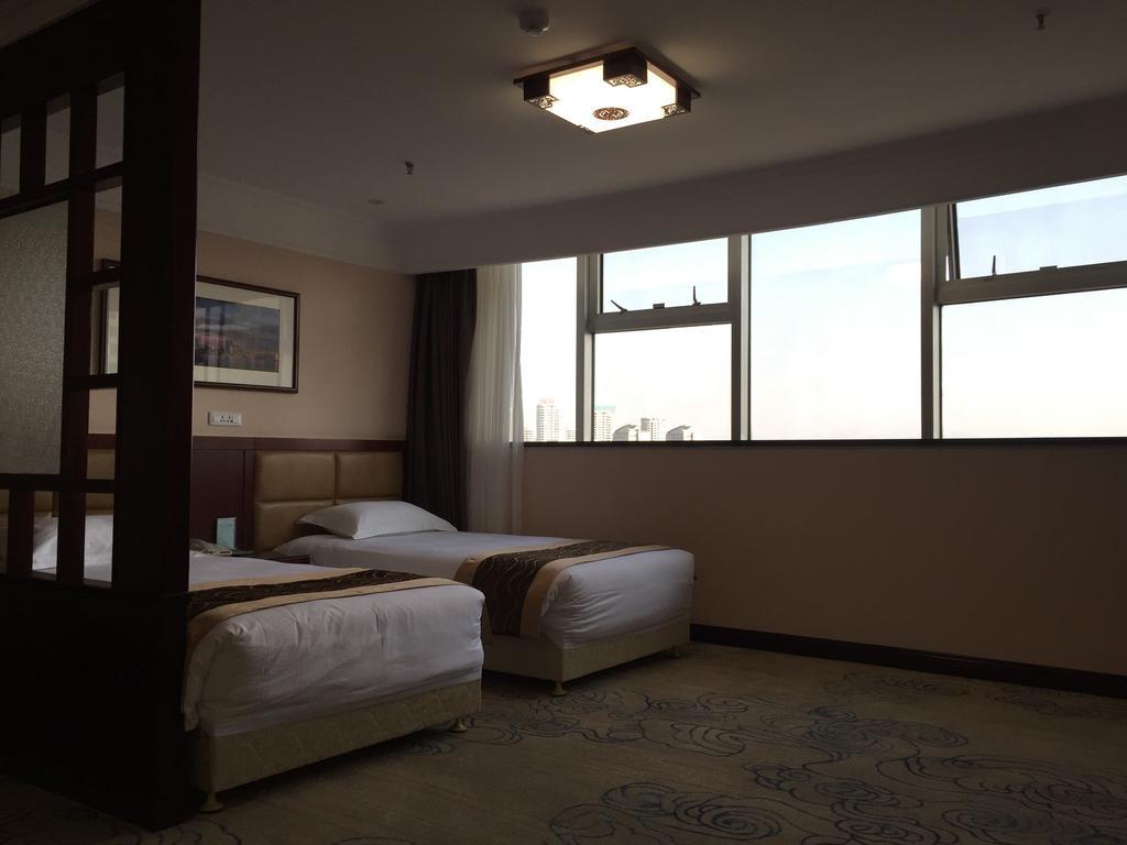 Qingdao Hotel Kamer foto