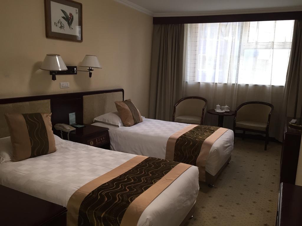 Qingdao Hotel Kamer foto